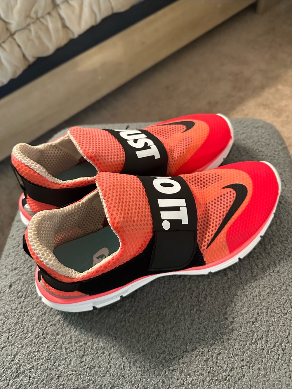 Nike Slip-On Sneakers in Coral and Black